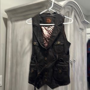 Leather, belted snap up vest